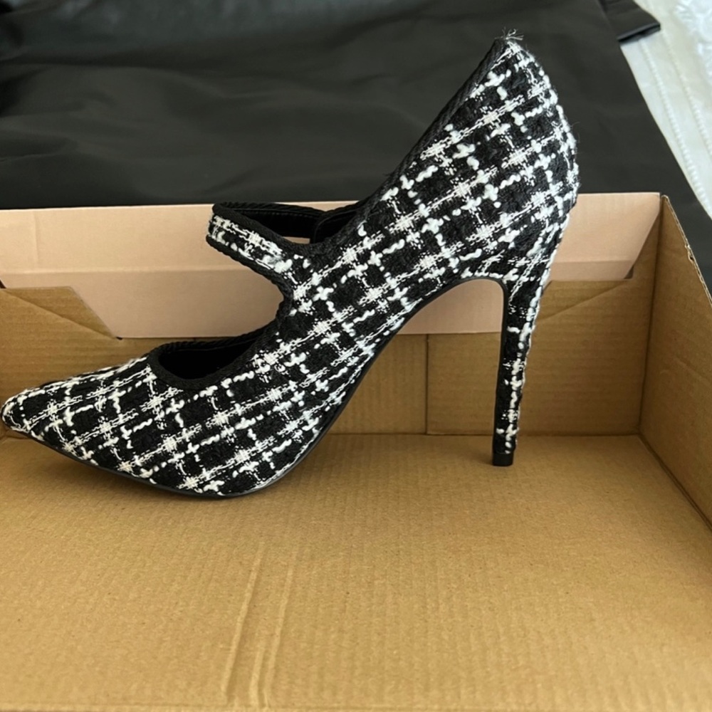 Black and white Mary Jane pumps